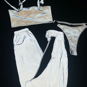 Reflective top bottom and chaps. Used it once for a party